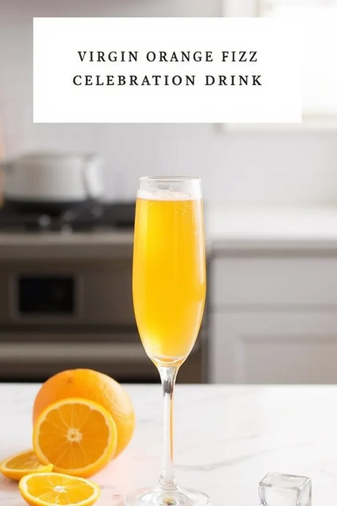 Orange fizz drink in glass with fresh oranges on a kitchen counter, perfect for celebrations.