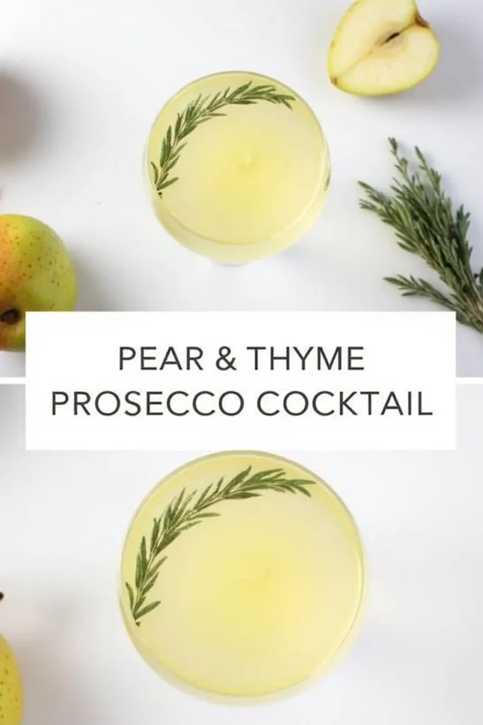 Pear and thyme prosecco cocktail with garnished rosemary sprig, surrounded by fresh pear slices.